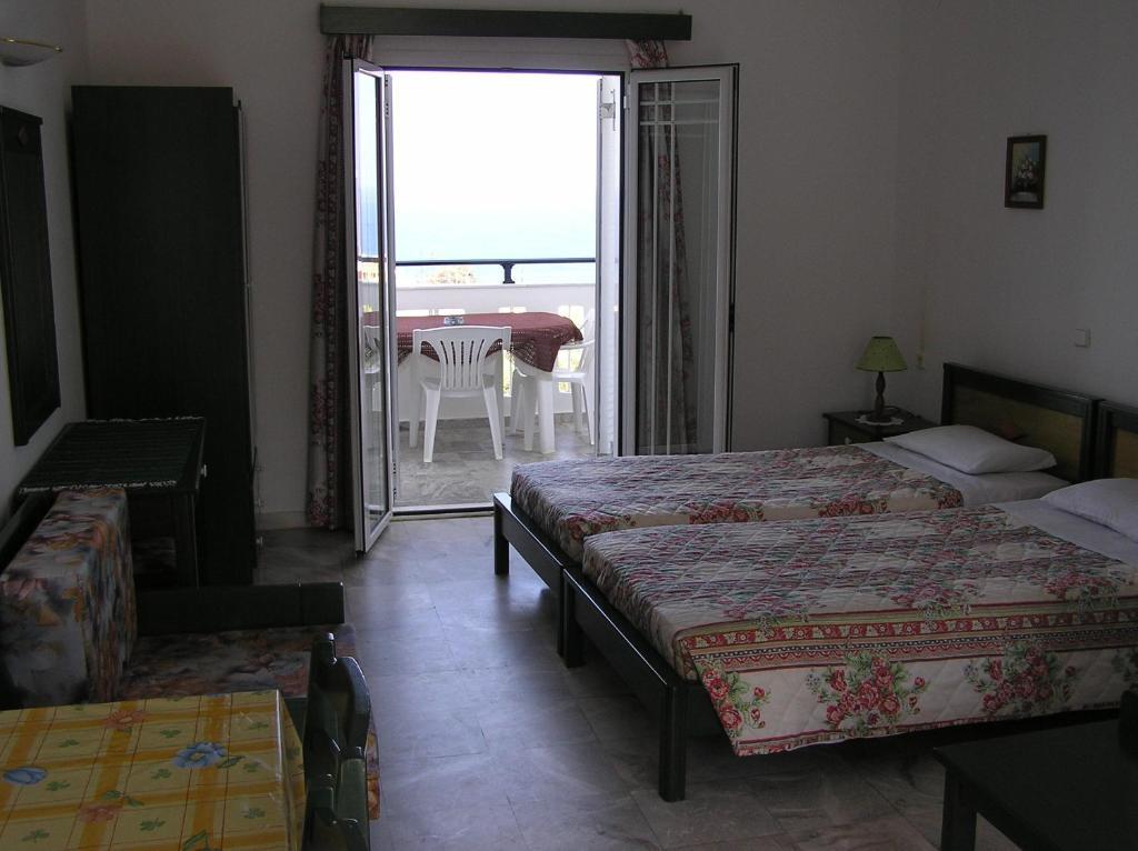 Aparthotel Knossos Pánormos Habitación foto