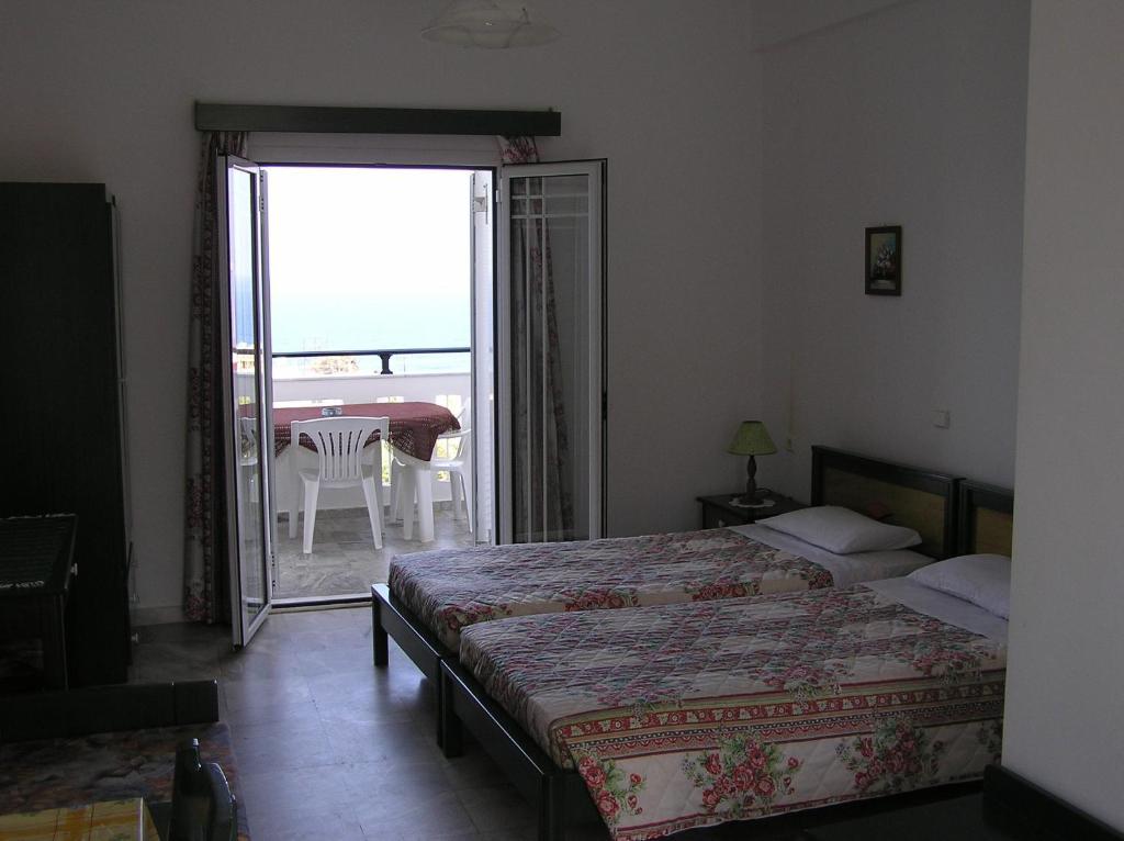 Aparthotel Knossos Pánormos Habitación foto